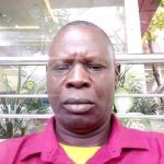 Mr. Peter Mbia, Director General