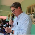 Picture of Dave Dettoni, and the Executive Vice President of Sudan Relief Fund (SRF) one of the principal donors speaking during the commissioning ceremony in Nzara [Photo Emmanuel Mandella]