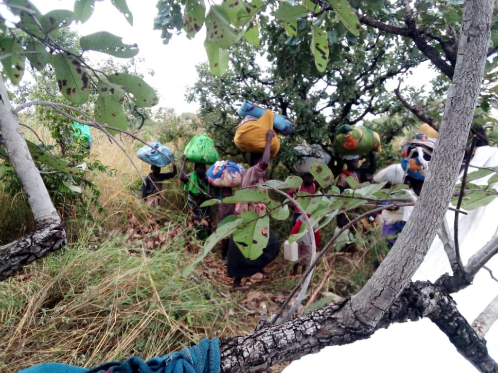 Picture of Women’s and their children’s living under trees in the bush in Nagero County